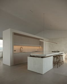 the kitchen is clean and ready to be used as a dining room or living area