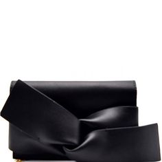 Giant twisted knot bow front vegan leather clutch handbag.

In-Stock Item: 2-day processing. Shipped 4-7 days. Casual Clutch, Bow Purse, Bow Clutch, Knot Bow, Vegan Purses, Faux Leather Purse, Faux Leather Handbag, Vegan Handbags, Vegan Leather Handbag