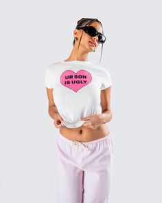 Taking “I woke up like this” to a new level in this two-piece set 💖🙌 Featuring a white jersey graphic top paired with pink stripe drawstring pants, this look will guarantee that you slay every waking moment 😏 Casual Pink T-shirt For Pajama Party, Trendy Pink Relaxed Fit Sleepwear, Pink Graphic Print Sleepwear For Loungewear, Pink Graphic Sleepwear For Loungewear, Pink Slogan T-shirt For Loungewear, White Cotton Sleepwear For Leisure, Trendy Pink Sleep Tops, Casual Pink Sleepwear With Graphic Print, Casual Pink Graphic Print Sleepwear