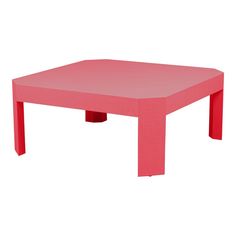 a pink table sitting on top of a white floor