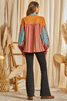 This beautiful striped pattern blouse features a suede panel with lace up detail. This top features gorgeous embroidery with long sleeves. One of a kind. Non sheer, woven. Spring Striped Long Sleeve Blouse, Spring Blouse With Striped Long Sleeves, Spring Long Sleeve Blouse With Striped Sleeves, Brown Patchwork Long Sleeve Blouse, Brown Embroidered Long Sleeve Blouse, Brown Floral Embroidered Long Sleeve Top, Brown Long Sleeve Top With Floral Embroidery, Long Sleeve Patchwork Blouse For Fall, Long Sleeve Boho Print Blouse For Fall