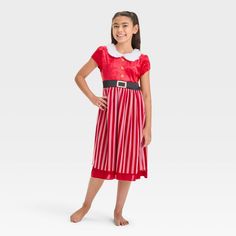 Add a festive touch to your kid's PJ collection with this Mrs. Claus Dress-Up Nightgown. Made of lightweight knit fabric, this red nightgown features a crewneck with a fluffy collar plus belt and button details to look just like Mrs. Claus' classic outfit. Designed in a pullover style with a regular fit, it's sure to be their new favorite pick for the holiday season. Mrs Claus Outfit, Mrs Claus Dress, Red Nightgown, Red Target, Christmas Dress Up, One Piece Clothing, Princess Dress Up, Classic Outfit, One Piece Pajamas