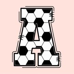 the letter a is made up of black and white soccer balls with spikes on it