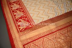 Experience the luxurious feel of our Butter Cream and Dark Red Banarasi Katan Silk Saree. Its intricate patola borders and pallu add a touch of elegance. Made from high-quality silk. Elevate your wardrobe with its timeless piece. The accompanying saree blouse is tailored and embellished with embroidered neckline and also back with handcrafted dori and tassels. The attention to detail further enhances it and gives the blouse a great finish. Elegant Red Saree With Embroidered Border, Red Silk Traditional Wear With Border, Elegant Red Traditional Wear With Border, Elegant Red Saree With Border, Red Paithani Silk Dupatta With Border, Red Anarkali Traditional Wear With Border, Banarasi Katan Silk Saree, Katan Saree, House Warming Ceremony