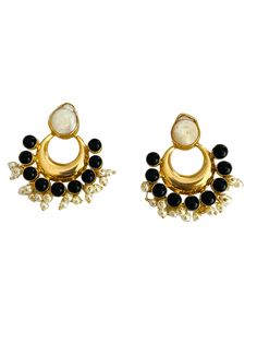 With a dash of black, an accent of gold and a sparking flash of white pearls, Vidyut earrings embodies the meaning of lightning. These drop earrings are sure to enhance your charm. The design further expands into a crescent motif with dangling pearls. A true representation of design innovation and mastery of skill, this pair is a collector’s item. Fusion Style Chandelier Earrings With Pearl Drop For Celebration, Fusion Style Pearl Drop Chandelier Earrings For Celebration, Elegant Chandbali Earrings With Dangling Beads, Elegant Gold Chandbalis With Dangling Beads, Fusion Chandbali Pearl Drop Earrings, Festive Chandbali Earrings With Pearl Pendant, Fusion Style Pearl Drop Danglers For Celebrations, Elegant Round Chandbalis With Pearl Drop, Elegant White Chandbalis With Pearl Drop