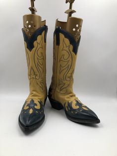 "Yellow and black men's cowboy boots, made from real leather, vintage style, embroidered with unique pattern, western style, fashionable streetstyle boots, cowboy boots, yellow and black color, has size 10 Description: - Sharp socks - Embroidered decorative stitching in black colors - The original embroidery on boots - On the both sides there are unique pattern - Leather inside and outside - No zippers and buckles - Delicate genuine vintage leather - Tabs on both sides of the boot shaft - Cowboy Yellow Western Leather Boots, Western Hand Tooled Boots For Festivals, Hand Tooled Western Boots For Festival, Retro Leather Boots For Rodeo, Retro Snip Toe Boots For Rodeo, Vintage Fitted Boots For Festivals, Vintage Fitted Festival Boots, Yellow Western Boots With Round Toe, Yellow Leather Boots With Snip Toe