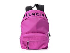 Balenciaga Nylon Wheel Logo Backpack Fuchsia. This stylish backpack is crafted of nylon in fuchsia. The bag features an embroidered black Balenciaga logo across the top, a front zipper pocket, a black canvas top handle, and adjustable padded black shoulder straps. The wrap-around silver zippers open the bag to a black nylon interior with zipper and patch pockets. This lovely backpack is spacious enough for all of your necessities, with the fashion forward appeal of Balenciaga!    Model: 565798 Nylon Logo Backpack, Logo Nylon Backpack, Nylon Backpack With Logo For Everyday Use, Everyday Nylon Backpack With Logo, Casual Nylon Backpack With Logo, Trendy Pink Nylon Backpack, School Nylon Bag With Logo, School Nylon Backpack With Logo, School Nylon Bags With Logo