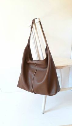 Cheap Brown Bags, Slouchy Brown Leather Bag, Brown Slouchy Bag, Black Leather Shoulder Bag For School, Brown Leather Hobo Bag, Slouchy Shoulder Bag, Tod Bag, Slouchy Leather Tote, Leather School Bag