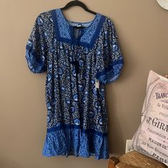 This Dress Would Be Cute Styled With A Jean Jacket. Fun Little Casual Dress. Different Shades Of Blue. Casual Boho Dress With Tassels For Vacation, Casual Boho Dress With Tassels, Casual Boho Dress With Tassels And V-neck, Casual Short Sleeve Dress With Tassel Ties, Casual V-neck Dress With Fringe, Casual V-neck Fringe Dresses, Bohemian Short Sleeve Dresses With Tassel Ties, Casual Tunic Dress With Tassels, Blue Boho Dress With Tassels For Summer