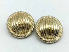 Lovely signed Coro gold-tone circle clip on earrings in excellent condition. Earrings measure 25 x 25 mm US SHIPPING: US orders over $35 or for 3 or more items ship free via first class mail. Orders over $150 receive a free priority mail upgrade. Expedited shipping is available. SHIPPING OUTSIDE THE US: We combine shipping on multiple item orders. Expedited shipping is available. Enter code FREESHIPINT for free shipping on orders over $200 GIFTS: Request complimentary gift messages & gift bo Gold-tone Clip-on Earrings For Formal Occasions, Gold-tone Round Clip-on Earrings For Formal Events, Gold-tone Round Clip-on Earrings For Formal Occasions, Types Of Gold, Sterling Silver Cat, Unique Packaging, Types Of Gifts, Gold And Silver Rings, 20 Gifts