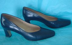 Women's ETIENNE AIGNER "Taylor" Navy Blue leather pump shoes - Size 9M.  Shoes have a square toe, a 2 1/2" high block heel and just slip on. Shoes are in excellent condition.  SMOKE FREE - PET FREE - CLEAN HOME International buyers please note that import duties, taxes, and charges are not included in the item price or shipping cost. These charges are the buyer's responsibility. Please check with your country's customs office to determine what these additional costs will be prior to purchasing. Classic Blue Court Shoes For Formal Occasions, Classic Blue Formal Court Shoes, Blue Fitted Court Shoes For Formal Occasions, Classic Blue Closed Toe Court Shoes, Blue Fitted Closed Toe Court Shoes, Fitted Blue Closed Toe Court Shoes, Blue Formal Court Shoes With 4-inch Heel, Blue Almond Toe Court Shoes, 2 Block