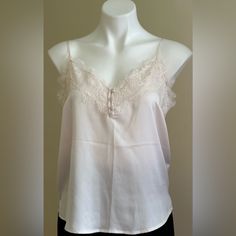 Abercrombie And Fitch Nwt White/Soft Pink Chemises Lace Sheer 3 Fabric Buttons Sz M Measurements Armpit To Armpit Is 18 Inches Length Is 21 Inches New To Poshmark? Sign Up Using Code Word:Midsiekac For $10. Off 1st Purchase! Feminine Lace Trim Sleep Tops, Feminine Pink Lace Top Camisole, Feminine Lace Tops For Loungewear, Feminine Camisole For Daywear, Feminine Cami Sleep Top, Elegant Sleep Tops With Lace Trim, Fitted Feminine Tops For Sleep, Feminine Lace Top Camisole For Loungewear, Feminine Lace Sleep Tops