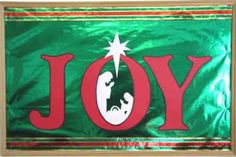 a christmas banner with the word joy in red and green