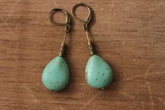 Turquoise Earrings Boho Earrings Dangle Earrings Teardrop Earrings Boho jewelry Bohemian Earrings Gift For women Color : Turquoise Teardrop Beads 20mm x 15mm Finish : Antiqued Brass findings Size : inches including the antiqued brass lever backs Ear wires : antique brass lever backs Brass Earrings section : https://www.etsy.com/shop/NtikArtJewelry?ref=seller-platform-mcnav&section_id=16059931 Thanks for looking Bohemian Turquoise Teardrop Earrings For Jewelry Making, Bohemian Teardrop Earrings With Lever Back, Elegant Handmade Turquoise Teardrop Earrings, Handmade Bohemian Turquoise Teardrop Earrings, Bohemian Turquoise Teardrop Earrings, Bohemian Turquoise Earrings With Intricate Design, Red Earrings Dangle, Boho Jewelry Earrings, Earthy Turquoise Dangle Earrings