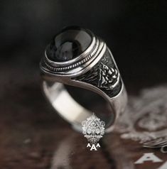 Item Specific Metal: Sterling Silver 92.5% Stone:Onyx size 14*12 mm Dimension: 31 x 19 x 23 mm Ring Weigh: 15.5 g Shipping - Shipping through Thailand Post by Economy Register Mail, taking 90-120 days (or more). - Expedited shipping service through DHL,taking 5-14 days delivery (Non Refundable). Exchange, Return and Refund - If you need to resize, exchange or return, please contact us. Collectible Symbolic Black Skull Ring, Spiritual Black Engraved Sterling Silver Ring, Black Gothic Collectible Rings, Black Symbolic Hallmarked Signet Ring, Symbolic Black Engraved Hallmarked Ring, Gothic Black Ring Stamped 925, Vintage Black Skull Ring In Sterling Silver, Vintage Black Sterling Silver Skull Ring, Black Engraved Round Ring