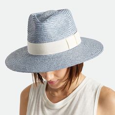 Updating The Signature Joanna Silhouette With A Shorter Brim And Soft Blue Color, This Brixton Hat Is Crafted In Woven Straw And Has A Minimalist-Meets-Summery Design. 100% Straw Adjustable Grosgrain Ribbon Trim Chic Fitted Fedora For Vacation, Chic Blue Beach Hat, Blue Chic Straw Hat For Summer, Fitted White Straw Hat For Vacation, Chic Blue Straw Hat For The Beach, Chic Blue Straw Hat For Summer, Light Blue Wide Brim Sun Hat For Beach, Casual Blue Straw Hat With Flat Brim, Blue Summer Hats For Day Out