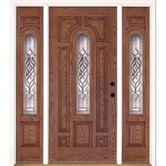 two double doors with sidelights and glass panels on the front door, both in dark wood