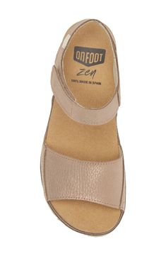 A leather-wrapped platform raises this sandal that offers total comfort with a contoured footbed that targets pressure points to relieve tension and stress. 1 3/4" heel (size 9) Adjustable hook-and-loop strap Zen footbed massages pressure points as you walk to relieve stress in the muscles and increase circulation Leather upper/textile lining/rubber and synthetic sole Made in Spain Leather Closed Toe Footbed Sandals With Arch Support, Cushioned Round Toe Sandals Medium Width, Leather Sandals With Textured Footbed Medium Width, Medium Width Sandals With Cushioned Footbed And Round Toe, Comfortable Wedge Heel Sandals With Removable Insole, Comfortable Leather Platform Sport Sandals, Medium Width Sandals With Leather Footbed And Round Toe, Medium Width Leather Footbed Sandals With Round Toe, Adjustable Leather Heels With Arch Support