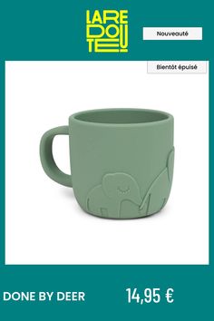 a green coffee cup with an elephant on it