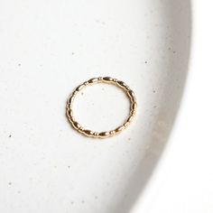 Handmade in Atlanta, Georgia, the gold Harmony Ring will never go out of style. Wear it on its own, or create a beautiful stack with other rings. Not only will it add a touch of glamour to your outfit, but it can be worn all the time. Even in the shower or pool! gold, simple, simplistic, e newton, newton, bead, beaded 14k Gold Filled Jewelry For Promise Ring Occasion, 14k Gold Filled Jewelry For Promise Ring, 14k Gold Filled Yellow Gold Toe Ring, 14k Gold Filled Toe Ring For Promise, Rose Gold 14k Gold-filled Toe Ring, Rose Gold 14k Gold Filled Toe Ring, 14k Yellow Gold Filled Stackable Open Rings, Gold Brass Rings With Round Band, Gold Stackable Midi Rings