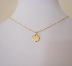 925 sterling silver or yellow gold small coin disc charm with chain necklace.Minimalistic charm necklace, simple and elegant.The yellow gold necklace is made with gold plated sterling silver chain and a gold filled disc.The sterling silver necklace is made with 925 sterling silver chain and a sterling silver disc.The charm is 9mm (0.35") in diameter The necklace comes bubble wrapped and gift wrapped in a complementary organza bag. Yellow Gold Necklace, Necklace Simple, 925 Sterling Silver Chain, Silver Pieces, Delicate Necklace, Gold Charm, Sterling Silver Charm, Gold Plated Sterling Silver, Spring Rings