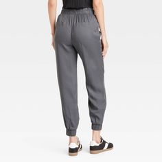 These High-Rise Jogger Pants from Universal Thread™ are made from lightweight lyocell fabric and tailored with a relaxed leg style to keep you in absolute comfort. The full elastic waist with drawstring offers an adjustable, secure fit, while the side pockets provide space for stashing everyday essentials. In a solid hue, they are easy to coordinate with a variety of tops for versatile wear. Universal Thread™: Found exclusively at Target. Versatile Mid-rise Bottoms For Elevated Casual Occasions, Versatile Tapered Leg Loungewear Pants, Relaxed Fit Mid-rise Bottoms With Elastic Waistband, Rayon Tapered Leg Workwear Bottoms, Elevated Casual Mid-rise Bottoms With Elastic Waistband, Elevated Casual Pants With Elastic Waistband And Tapered Leg, Versatile Comfort Stretch Sweatpants With Tapered Leg, Versatile Tapered Leg Comfort Stretch Sweatpants, Chic Tapered Leg Rayon Pants