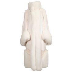 Very rare and dramatic off-white fur coat made of mink, fox and lamb fur from Alexander McQueen. Labeled an Italian size 42. Approximate measurements: shoulder 16", bust, waist and hip are open due to cape like design at back. Sleeves are very full. Hidden fur hooks at front. Quilted silk lining. Made in Italy. Excellent condition. White Fur Coat, Alexander Mcqueen Fashion, Fox Fur Jacket, Fur Jackets, Outfit Plan, Future Outfit, 2000s Fashion Outfits, Fox Fur Coat, White Fur