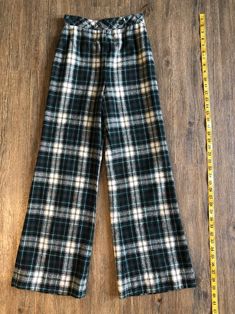 Vintage 1970's JH Collectibles Plaid Bell Bottom Flared Pants Pants Fit Woman's Size : Small (See Photos for Measurements) Willing to Answer Any and All Questions about Items. All Items Sold AS IS. No Refunds. No Returns. Note* Items are not laundered unless adopted personally before selling, to reduce costs & to help combat the ongoing drought in California. For More Photos & Other Items Visit : DeadPeoplesShit.com Retro Wide Leg Bottoms For Fall, Retro Winter Trousers, Vintage Trousers For Winter, Vintage Winter Trousers, Vintage High Waist Winter Pants, Vintage Full Length Bottoms For Winter, Vintage Wide Leg Bottoms For Fall, Vintage Full-length Winter Pants, Fall Vintage Wide Leg Bottoms