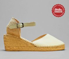 "Diegos - Ivory white leather Carmen espadrilles with high wedge heel Wedge sole height : 2.5\" (6 cm) Classic ivory white leather high wedge Carmen espadrilles have an easy clip-on ankle-strap. The rope sole has been meticulously shaped by hand, a padded insole has been added for your comfort. The high quality leather used on these beautiful and elegant espadrilles, is 100% genuine Spanish Leather. We ship from NY - Easy returns." Cream Closed Toe Espadrilles With Rubber Sole, Natural Leather Wedge Heel Espadrilles, Cream Leather Espadrilles For Beach, Cream Leather Open Toe Espadrilles, Cream Leather Espadrilles For The Beach, White Leather Espadrilles With Woven Sole, Cream Wedge Heel Espadrilles, White Leather Espadrilles With Round Toe, Cream Closed Toe Platform Espadrilles