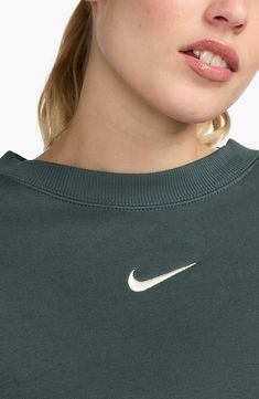 An embroidered Swoosh adds minimal branding to this cozy fleece sweatshirt cut for a relaxed, oversized fit that's enhanced by the dropped shoulders. 22" length (size Medium) Crewneck 80% cotton, 20% polyester Machine wash, tumble dry Imported Nike Phoenix Fleece, Minimal Branding, Cut Sweatshirts, Fleece Sweatshirt, Oversized Fits, Crewneck Sweatshirt, Phoenix, Crew Neck Sweatshirt, Nordstrom