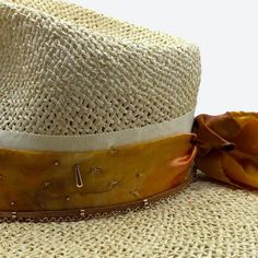 This light and airy straw hat will be the right addition for a day by the water. Very breathable but will still give lots of shade, it’s the new must! Hand-dyed silk and cotton ribbons Suede thread with 18k gold square wire ring 18k gold filled chain link chain Handmade 24k yellow sea waves 24k gold plated crimp beads 14k gold plated drop charm 14k gold plated twisted beads Silver Swarovski rhinestone Sweatband with ‘As Free As The Ocean’ inspirational quote All hats are unique and have perfect As Free As The Ocean, Free As The Ocean, Yellow Sea, Straw Fedora Hat, Straw Fedora, Felt Fedora, Crimp Beads, Wire Ring, Dyed Silk