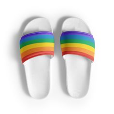 Rainbow LGBTQ+ Women's Slides. A must-have for the summer: these women's slides. A pair of these will keep you comfy throughout your day of beach or pool activities, thanks to the cushioned upper strap and the textured footbed.  * Cushioned and durable faux leather upper strap * Lightweight polyurethane (PU) outsole * Contoured, textured footbed * Spot clean only * Printed, cut, and handmade * Blank product sourced from China Important: This product is available in the following countries: United States, Canada, Australia, United Kingdom, New Zealand, Japan, Austria, Andorra, Belgium, Bulgaria, Croatia, Czech Republic, Denmark, Estonia, Finland, France, Germany, Greece, Holy See (Vatican city), Hungary, Iceland, Ireland, Italy, Latvia, Lithuania, Liechtenstein, Luxemburg, Malta, Monaco, Ne Flat Sandals For Beach In Summer, Multicolor Slip-on Slides For Summer, Casual Slip-on Flip Flops For Vacation, Casual Flat Bottom Sandals For Summer, Casual Flat Sandals For Summer, Casual Poolside Slip-on Slides, White Flat Slides For Leisure, Casual Slip-on Flip Flops With Round Toe, White Open Toe Sandals For Leisure