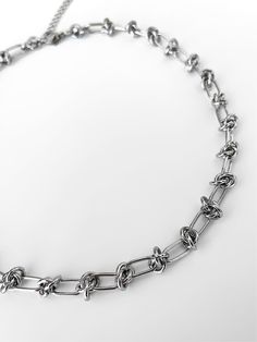 The necklace you didn't know you needed until now - made with stainless steel chain, the 'BARBED WIRE' chain is bound to be your new everyday staple! With its versatility, this chain can be layered with pearls, pendant chains, or worn on its own to complete any outfit! Made with stainless steel chain. Waterproof and rust-free. Available in lengths 15", 16", 18", 20", 22". All lengths include a 2" extension chain. Model is wearing 16". Handmade in Los Angeles. Minimalist Chunky Chain Stainless Steel Necklace, Minimalist Stainless Steel Necklace With Chunky Chain, Minimalist Stainless Steel Chunky Chain Necklace, Trendy Stainless Steel Link Chain Necklace, Adjustable Stainless Steel Charm Necklace With Chain, Stainless Steel Choker Chain Necklace As Gift, Adjustable Stainless Steel Charm Necklace, Stainless Steel Choker Chain Necklace For Gift, Stainless Steel Choker Chain Necklace Gift