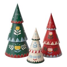 three small christmas trees are shown in different colors and designs, one is red, the other is green