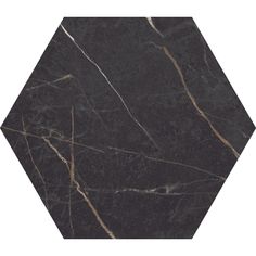 a black marble hexagonal tile with gold veining