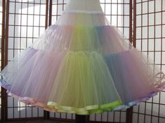 This listing is for a custom version of the pastel rainbow tulle petticoat shown in the photos. The waist area is as fitted as possible so that it just fits over the largest part of the body. The waistband is .5 (1,25cm) wide elastic covered with white polyester satin for comfort. The waist area has Fitted Multicolor Tulle Dress, Fitted Tulle Petticoat For Spring, Spring Fitted Organza Petticoat, Fitted Spring Organza Petticoat, Fitted Organza Petticoat For Spring, Petty Coat, Tulle Petticoat, Petticoat Skirt, Rainbow Ribbon