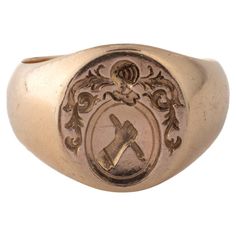 A French Victorian 15 Kt signet ring that shows all the signs of power. There is an arm raised up showing a dagger. This symbol shows the willingness to prevail. Above the arm is a warriors helmut with face protector. this was either the ring of a warrior or of a family who wanted to show its power. The engraving is crisp although the ring dates to c. 1870. Acanthus leaves trail around the crest. In Mediterranean countries it symbolizes enduring life and immortality. Oddly in Christianity the meaning is opposite. It symbolizes pain and punishment of death. Either can be applied to the power shown in this ring. Excellent Condition French Eagle on back of shank. Size 8 Weight 10.2 grams Mediterranean Countries, French Victorian, Acanthus Leaves, Acanthus Leaf, French Antique, The Signs, Antique Victorian, Signet Ring, French Antiques