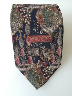 "Vintage Metropolitan Museum Of Art Mens tie, Black Background, Multi colored Patterns, Imported Silk,  Wedding Accessories, Gift for Him Elevate your formal attire with our Vintage Metropolitan Museum Of Art Men's Tie. This exquisite accessory boasts a striking black background adorned with vibrant multi-colored patterns, adding a touch of sophistication to any ensemble. Crafted from imported silk, it exudes a sense of luxury and timeless elegance. Whether you're dressing for a wedding or a spe Mens Tie, Men's Tie, Silk Wedding, Pretty Necklaces, Formal Attire, Stylish Gifts, Metropolitan Museum Of Art, Metropolitan Museum, Museum Of Art