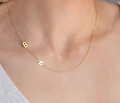 "This couple initial name necklace (Sideways Initial Necklace, Gold Spaced Letter Necklace ) is perfect Christmas gift for women or partner birthday gift! Also, this gold couple initial name necklace would make a great gift for mother birthday, engagement, anniversary, graduation, bridal shower or a treat for you! Trendy and timeless, this dainty sideways initial necklace has been produced with high quality 925k solid silver and available in silver, gold and rose gold colour. You can personalised your jewellery any initial(s), birthstone(s) or charm(s). FEATURES: *available in rose, gold & silver colour * chain in different lengths * great for daily wear * hypoallergenic * nickel-free, lead-free & cadmium-free * handmade in the UK * arrives in gift box * can include your gift message (leav Gold Initial Necklace With Custom Name For Anniversary, Gold Initial Pendant Necklace For Birthday, Gold Initial Necklace For Birthday, Gold Initial Necklace For Mother's Day Birthday, Birthday Initial Pendant Necklace With Clavicle Chain, Gold Initial Necklace For Anniversary Gift, Gold Initial Necklace For Birthday Gift, Dainty Gold Initial Necklace Birthday Gift, Dainty Gold Initial Necklace For Birthday Gift