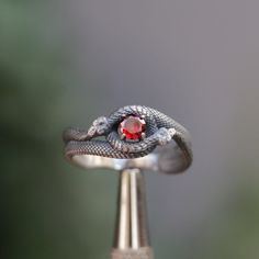 Ruby Stone Snake 925 Silver Ring, Health Symbol Snake, Self-Eating Snake Symbol 925 Sterling Silver, Emerald Snake Oxidized Silver Ring Let's not forget that it is handmade. There may be minor differences. I can work the same ring with other natural Gemstones.  Please contact us to learn about our Gem stone stocks. If you have any questions, please feel free to contact me, we are happy to help. Your jewelry will be packed in a luxury jewelry box ready to be given as a special gift. Visit my shop Gemstone Snake Ring Gift, Red Symbolic Sterling Silver Ring, Sterling Silver Hallmarked Ruby Ring, Unique Sterling Silver Ruby Birthstone Ring, Anniversary Gemstone Snake Ring, Anniversary Snake Ring With Gemstone, White Gold Sterling Silver Ruby Ring Stamped 925, Sterling Silver Ruby Ring In White Gold, White Gold Ruby Ring In Sterling Silver