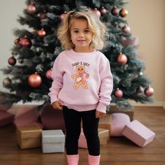 Sugar And Spice Glitter Gingerbread  Our Mommy and me  crewneck sweatshirt set is adorable for mama's and their littles. Who doesn't love twinning?  Sizing  Gildan unisex crewneck sweatshirts. As there is still a shortage of inventory we will be using gildan, bella and independent brands. We will be using Rabbit and gildan for toddlers and gildan and Bella for youth. SHIRT COLOR INFO: When ordering more than one shirt in different sizes/styles, please be aware that there might be some variations Gingerbread Sweater, Preppy Xmas, Mommy And Me Christmas, Youth Shirt, Sweatshirt Set, Sweat Shirts, Toddler Tees, Sugar And Spice, Christmas Sweater