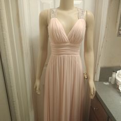 New Party Dress From Windsor Store,Peach Color With Emblelishm All Over The Back On Tornasol Color,My Doughter Was In Love With The Way This Dress Fits,But She Never Use It Tags Are Still On, Only Thing Missing Is The Little Part To Closed From The Back,But Doesn't Affect When Wearing,Size 3/4 Peach Sleeveless Prom Dress, Peach Evening Dress With Sweetheart Neckline, Peach Sweetheart Neckline Evening Dress, Peach Sleeveless Maxi Dress For Party, Sleeveless Peach Maxi Party Dress, Sleeveless Peach Maxi Dress For Party, Silver Sleeveless Bridesmaid Dress, Peach Party Dress With Sweetheart Neckline, Peach Sweetheart Neckline Party Dress