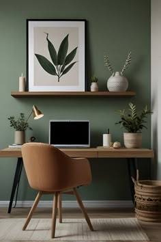 a desk with a laptop and some plants on it in front of a green wall