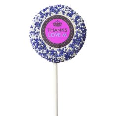 a purple and black lollipop with the words thanks love me on it's center