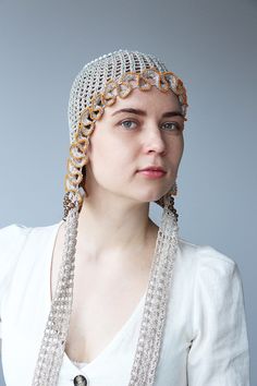 Hand crochet boho hat for summer, unisex fashion knitwear design. Hat was decorated by beads. Materials: Viscose and metallized polyester yarns. Seed beads. Glass beads. FREE SHIPPING. We offer fast shipping. Europe 1 - 2 days after dispatch. Word wide 2 - 5 days after dispatch. CUSTOM ORDERS. I love doing custom orders! Please contact me with your requests. Special orders are priced accordingly and cannot be returned or exchanged. All my works are original and 100% handmade. Only registered sen Adjustable Headpieces For Beach Spring Season, Bohemian Headpieces For Beach Summer, Adjustable Crochet Party Hat, Handmade Summer Festival Headpieces, Summer Beach Headband Headpiece, Bohemian Beach Headband, Bohemian Beaded Hats For Party, Festival Bead Caps Headpiece, Bohemian Silver Hat For Festivals