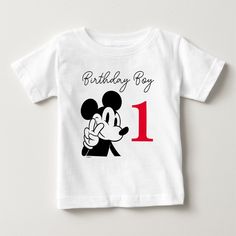 Make your little one's birthday extra special with this delightful Mickey Mouse Birthday Boy Shirt. Featuring the beloved Mickey Mouse, this shirt is a charming accessory for any birthday celebration. Disneyland Birthday Shirts Boy, White Mickey Mouse T-shirt For Birthday, Mickey Mouse Crew Neck Top For Birthday, Mickey Mouse Crew Neck T-shirt For Birthdays, Mickey Mouse Crew Neck T-shirt For Birthday, White Mickey Mouse Top For Birthday, Cute Birthday Shirt With Cartoon Print, Cute Cartoon Print Shirt For Birthday, Cute Minnie Mouse Top For Birthday