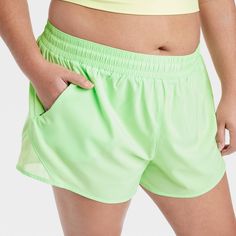 Why we're ALL IN: Mid-rise shorts designed in a solid hue to take you through anything from training sessions and walks to intense runs in effortless comfort. Tailored in regular-fit, these mid-rise shorts are designed from a moisture-wicking fabric with a quick-dry finish to help keep you cool and dry. A full elastic waistband provides a secure fit, while a side zippered pocket finishes off the sporty look. All in Motion™: Made for every move, priced for every day. Green Athletic Shorts With Elastic Waistband For Training, Green Athletic Shorts With Elastic Waistband For Sports, Green Athletic Fit 2-in-1 Shorts, Short Athletic Shorts With Light Support For Sports, Solid Color Sportswear Athletic Shorts For Running, Green Athleisure Shorts For Running, Green Athleisure Running Shorts, Green Go-dry Athletic Shorts For Sports, Green Athletic Shorts With Built-in Liner For Running