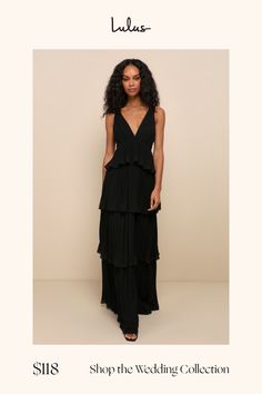 The ambiance of any room will be instantly more elegant when you walk in wearing the Lulus Mesmerizing Essence Black Pleated Backless Tiered Maxi Dress! Airy, pleated woven chiffon shapes a sleeveless bodice with a flirty V-neckline and slender tying straps that secure above an even flirtier open back, all supported by wide shoulder straps. The flattering, empire-style waist tops a sweeping maxi skirt adorned with flouncy tiers throughout the A-line silhouette. Hidden back zipper/clasp. Fit: Thi Pleated Gown, Lulu Fashion, Dress Pleated, Bridal Party Dresses, Empire Style, Tiered Maxi Dress, Dress 100, Walk In, Floor Length