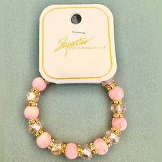 This Gorgeous Bracelet Can Be Worn Alone Or Stacked With Other Bracelets. The Beautiful Light Pink Beads Are Brushed With Metallic Gold. The Rhinestones Sparkle And Shine In The Light For An Angelic Glow! Gold Stretch Bracelet, Fashion Beads, Sparkle Jewelry, Sparkle And Shine, Pink Beads, Gorgeous Bracelet, Beautiful Lights, Stretch Bracelet, Metallic Gold