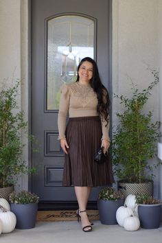 Lennon features a brown faux suede, in a knife pleat and elastic waistband. Dress it up or wear it casual! Modeled in large, and paired with our new Ashlyn knit top. 90% Polyester/10% Spandex Small (waist 28-30"/length27") Medium (waist 30-32"/length 27") Large (waist 32-34"/length 27") Fitted Skirt With Elastic Waistband For Fall, Fitted Lined Pleated Skirt For Fall, Chic Brown Pleated Skirt For Winter, Casual Fitted Brown Pleated Skirt, Stretch Skirt For Date Night In Fall, Brown Pleated Skirt For Winter Workwear, Fall Workwear Pleated Lined Skirt, Fall Pleated Lined Skirt For Work, Casual Fitted Pleated Skirt For Fall